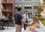Thumbnail 19 of 27 - Elevated Courtyard with Grilling Stations at Nightingale.  Providence, RI 02903,