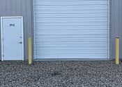 Thumbnail 5 of 13 - A white door with the number 202 on it is closed.