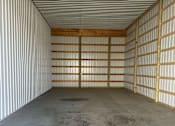 Thumbnail 11 of 13 - The inside of a storage container with a grey floor and a white ceiling.
