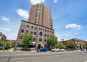 Thumbnail 1 of 22 - Street view of Irvine Park Towers high-rise apartment building in St. Paul