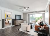 Thumbnail 10 of 26 - Living Room With TV at Atler at Brookhaven, Atlanta, GA, 30319