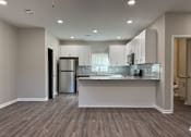 Thumbnail 2 of 27 - New 3 bedroom kitchen with a countertop and cabinets.