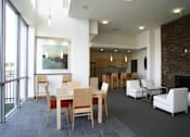 Thumbnail 27 of 29 - A dining room with a table and chairs.at 66 Main, Yonkers, NY