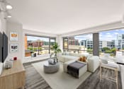 Thumbnail 1 of 29 - A modern living room with a large window overlooking the city.