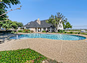 Thumbnail 15 of 17 - A house with a pool in the backyard.