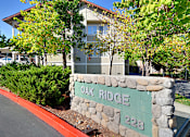 Thumbnail 3 of 30 - A sign that says Oak Ridge 228 in front of a building.