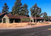 Thumbnail 8 of 42 - A building with a brown roof and a sign that says "Fruiterer Dinner".
