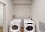 Thumbnail 11 of 27 - Washer and dryer in a laundry room  at The Landing Apartments, Indianapolis, 46234