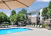 Thumbnail 6 of 46 - Pool With Lounge Chairs at Standing Bear Lake, Nebraska, 68164