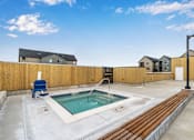 Thumbnail 33 of 36 - A small pool with a blue chair and a wooden fence.