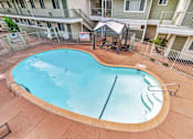 Thumbnail 21 of 29 - A small pool with a blue line in the middle.