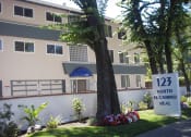 Thumbnail 16 of 31 - an image of an apartment building with a sign for 121 north el camino real