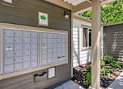 Thumbnail 37 of 41 - A mailbox with the number 101 on it is on the side of a building.