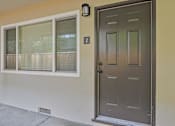 Thumbnail 2 of 47 - A brown door with a number 2 on the wall above it.
