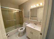 Thumbnail 31 of 41 - a bathroom with a urinal and a sink in it