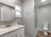 Thumbnail 22 of 53 - a bathroom with a toilet sink and a shower