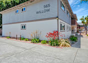 Thumbnail 8 of 25 - A building with the number 565 and the word Willow on it.