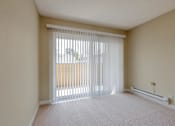 Thumbnail 20 of 33 - the spacious room with sliding glass doors to the patio