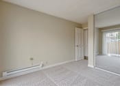 Thumbnail 17 of 33 - the living room with a door to a balcony