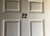 Thumbnail 44 of 62 - a white door with a door knob on it