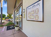 Thumbnail 39 of 67 - A sign for Casa Alberta Apartments is displayed on a building.