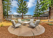 Thumbnail 9 of 53 - a patio with chairs and tables in front of a building