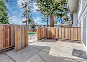 Thumbnail 46 of 53 - the private patio is enclosed by a wooden fence