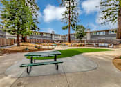 Thumbnail 6 of 53 - our apartments have a community picnic area with a green picnic table