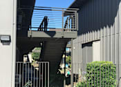 Thumbnail 24 of 30 - the stairs to the balcony of a house