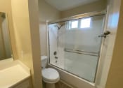 Thumbnail 37 of 51 - a bathroom with a toilet and a rainbow wall