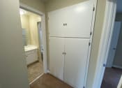 Thumbnail 44 of 51 - a kitchen with white cabinets and a white refrigerator
