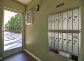 Thumbnail 14 of 51 - a locker room with lockers next to a door