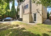 Thumbnail 5 of 51 - a car parked in front of an apartment building