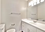 Thumbnail 16 of 62 - Bathroom With Vanity Lights at Laurel Grove Apartments, Menlo Park, 94025