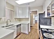 Thumbnail 22 of 62 - Kitchen With New Appliances at Laurel Grove Apartments, Menlo Park, California