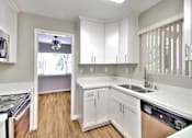 Thumbnail 23 of 62 - Kitchen With Custom Cabinetry at Laurel Grove Apartments, Menlo Park, 94025