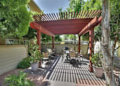 Thumbnail 34 of 37 - Shaded Outdoor Courtyard Area With Grill at Aviana, Mountain View, 94040