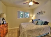 Thumbnail 15 of 35 - comfortable bedroom with ceiling fan  at The Arbors at Mountain View, Mountain View, CA