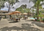 Thumbnail 63 of 103 - Poolside Dining Tables at Balboa Apartments, California