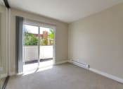 Thumbnail 55 of 80 - Living Room With Balcony at Casa Alberta Apartments, Sunnyvale, California