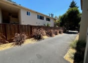 Thumbnail 7 of 19 - an empty driveway in front of a house