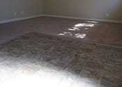 Thumbnail 18 of 31 - an empty room with brown walls and a tiled floor