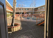 Thumbnail 40 of 62 - the stairs in a building with a blue sky in the background