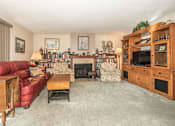 Thumbnail 19 of 41 - a living room with multicolored tiles on the floor
