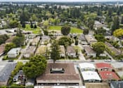 Thumbnail 11 of 43 - an aerial view of a neighborhood with houses and trees