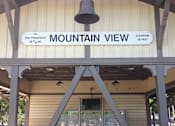 Thumbnail 10 of 14 - a view of the entrance to a mountain view pavilion