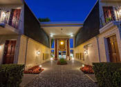 Thumbnail 3 of 51 - a night time view of the front entrance of the ascend hotel collection
