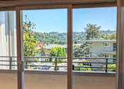 Thumbnail 11 of 11 - a view of the balcony from the living room