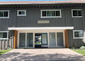 Thumbnail 17 of 30 - the front door of the renovated plans building