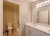 Thumbnail 18 of 20 - the preserve at ballantyne commons apartment bathroom with toilet and sink
